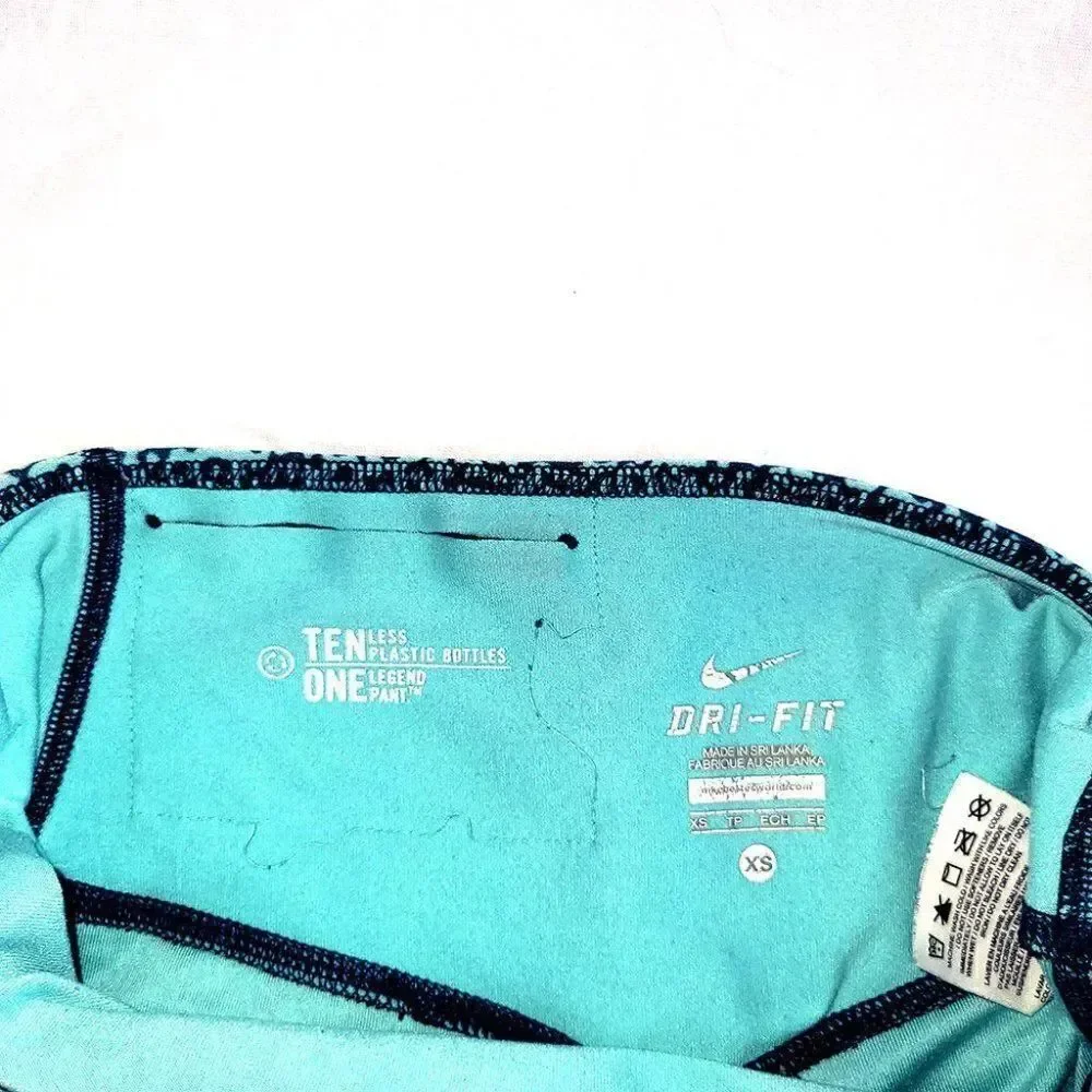 Nike turquoise animal print One Legend sweat yoga pants